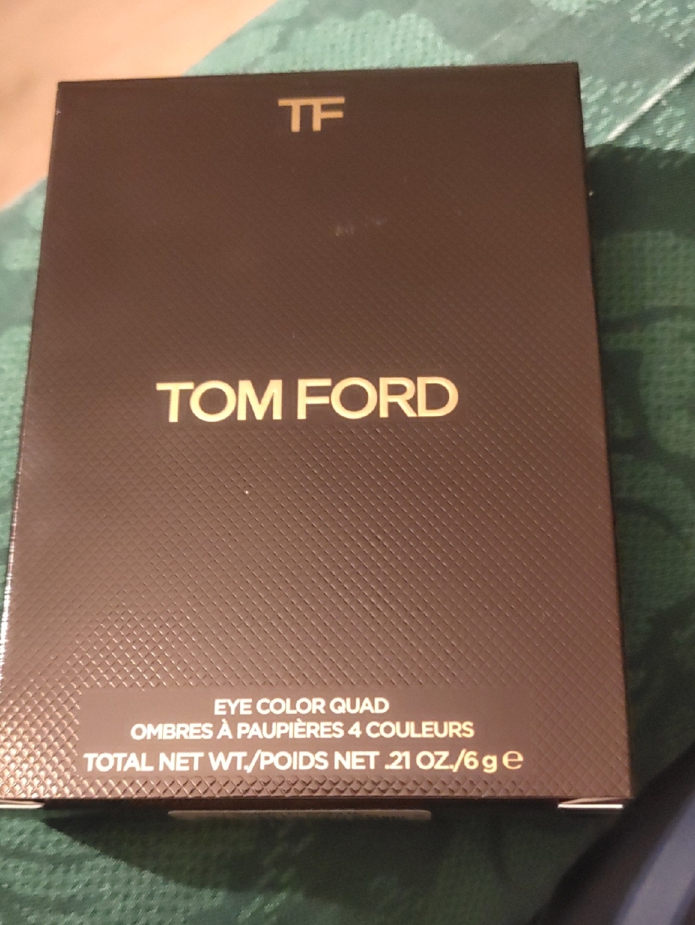 Tom Ford Brown and Gold Eye Color qua